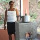 perene institute woman and cook stove